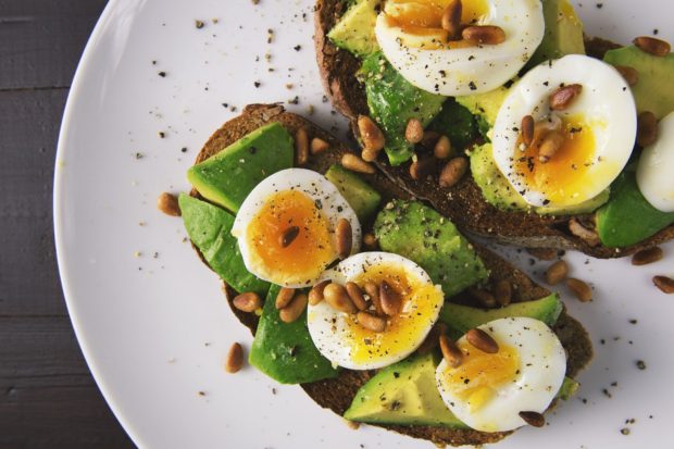 Healthy food: toast with avocado and boiled egg