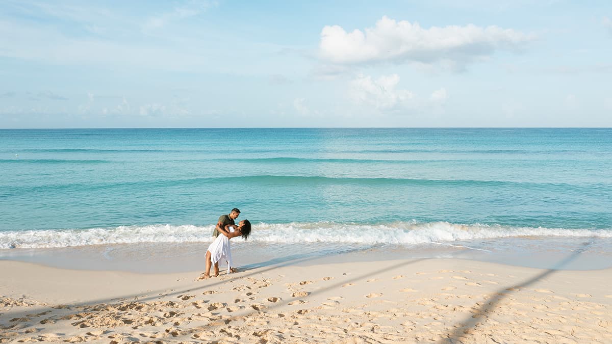 romantic kiss by the beach