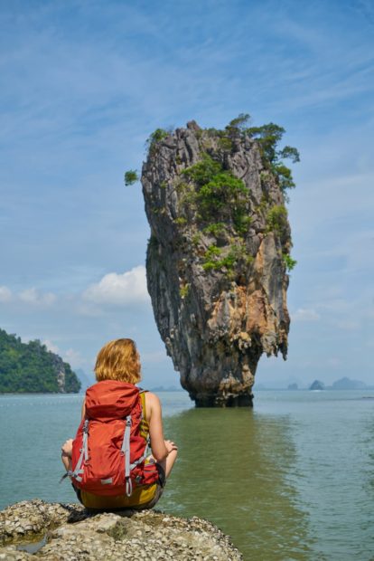 Woman doing meditation while going on a journey