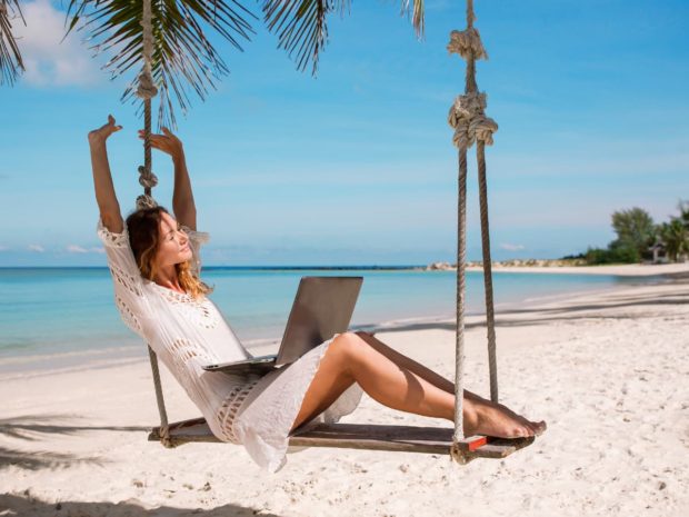 Woman working at the Beach