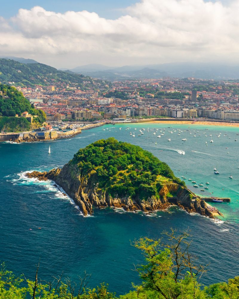 Aerial view of turquoise bay of San Sebastian or Donostia with beach La Concha in a beautiful summer day, Basque country, Spain